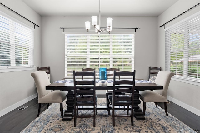 1867 W 137th Ln, Broomfield, CO 80023 - dining room with a chandelier, plenty of natural light, and wood finished floors