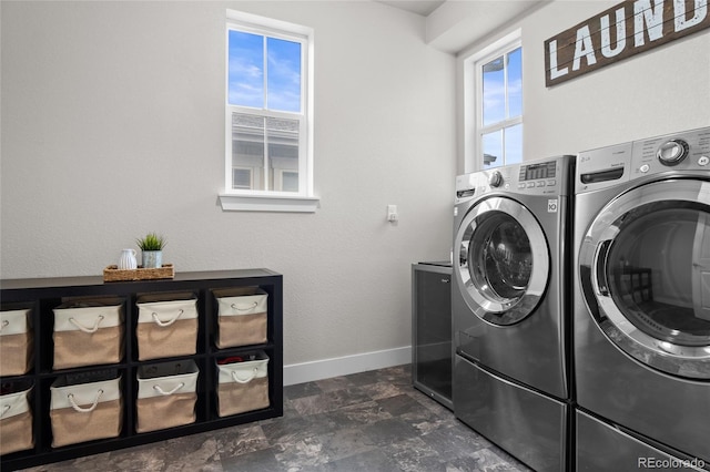 1867 W 137th Ln, Broomfield, CO 80023 - washroom featuring independent washer and dryer and dark stone finish floors