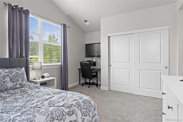 1867 W 137th Ln, Broomfield, CO 80023 - carpeted bedroom featuring vaulted ceiling, a desk, and a closet