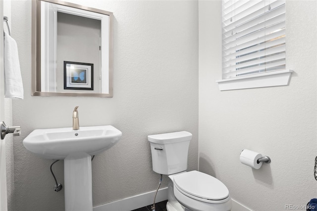 1867 W 137th Ln, Broomfield, CO 80023 - bathroom with toilet and baseboards