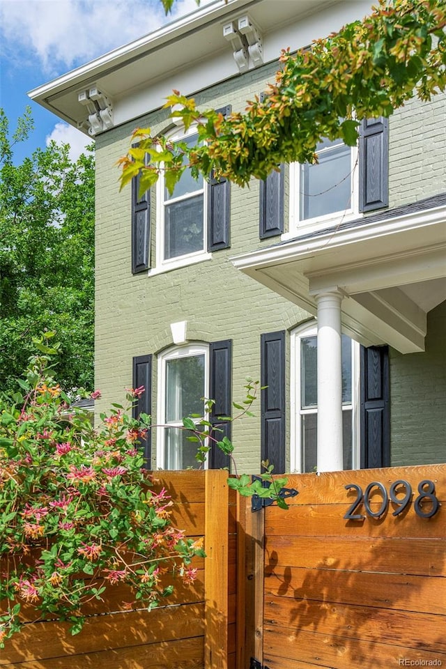2098 N Clarkson St, Denver, CO 80205 - doorway to property with brick siding