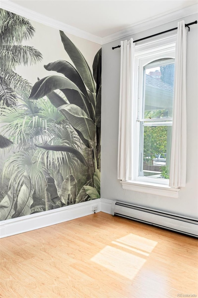 2098 N Clarkson St, Denver, CO 80205 - detailed view of wood finished floors, ornamental molding, and a baseboard heating unit
