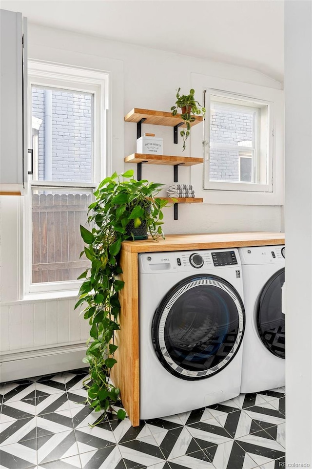 2098 N Clarkson St, Denver, CO 80205 - washroom with washing machine and clothes dryer