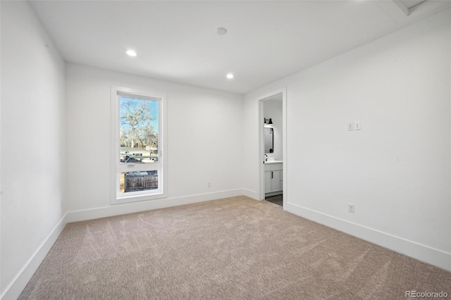 empty room with carpet flooring