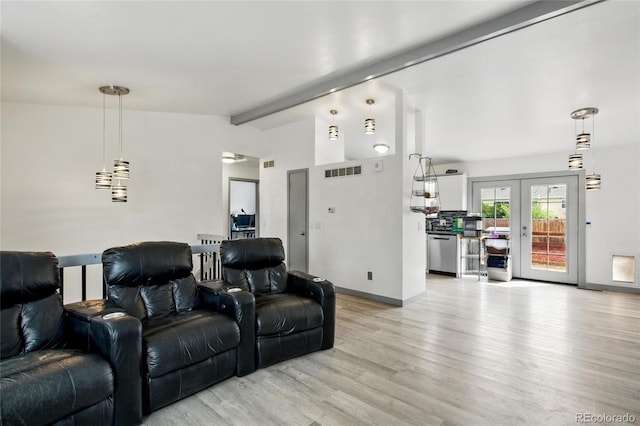 3902 S Uravan St, Aurora, CO 80013 - home theater room featuring light wood-type flooring and baseboards