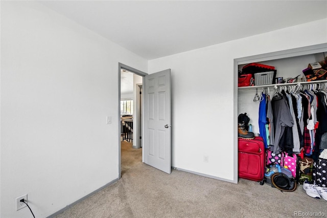3902 S Uravan St, Aurora, CO 80013 - carpeted bedroom with a closet and baseboards