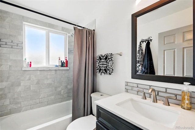 3902 S Uravan St, Aurora, CO 80013 - full bath featuring vanity, decorative backsplash, toilet, and shower / bath combo with shower curtain