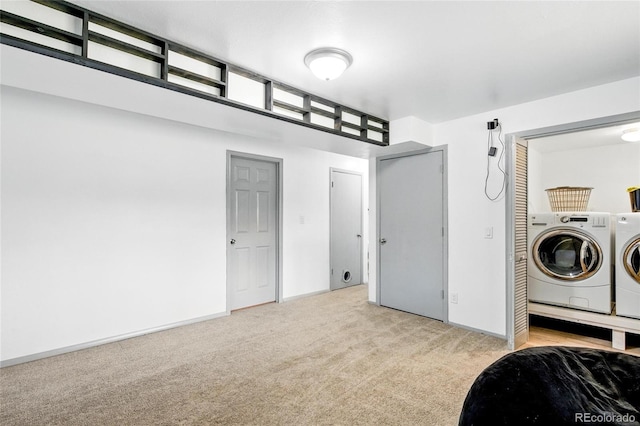 3902 S Uravan St, Aurora, CO 80013 - laundry area featuring washing machine and clothes dryer, carpet flooring, and baseboards