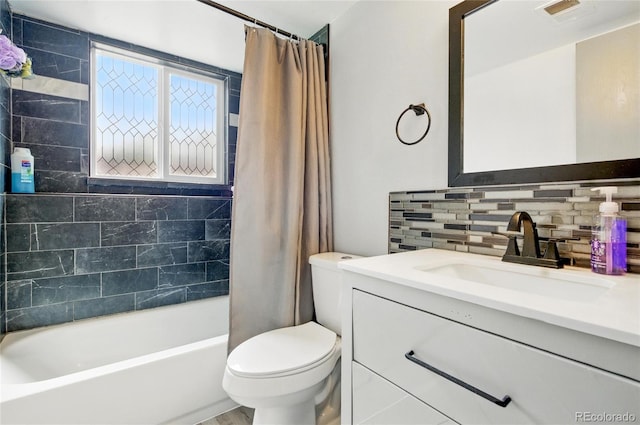 3902 S Uravan St, Aurora, CO 80013 - full bath with toilet, vanity, tasteful backsplash, and shower / tub combo with curtain