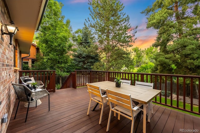 7308 S Steele Cir, Centennial, CO 80122 - deck at dusk featuring outdoor dining area