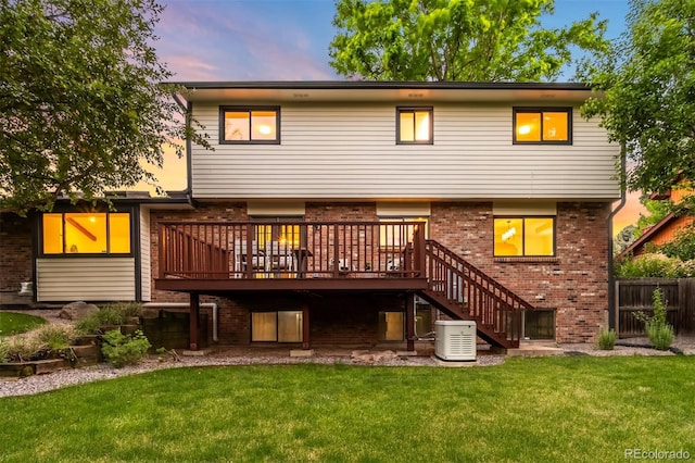 7308 S Steele Cir, Centennial, CO 80122 - rear view of property with brick siding, a deck, and stairs