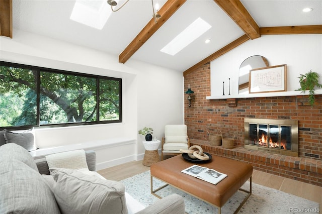 7308 S Steele Cir, Centennial, CO 80122 - living area featuring a skylight, wood finished floors, a fireplace, and recessed lighting