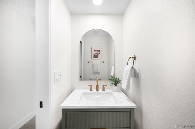 7308 S Steele Cir, Centennial, CO 80122 - bathroom featuring vanity and baseboards