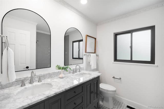 7308 S Steele Cir, Centennial, CO 80122 - full bath with double vanity, healthy amount of natural light, and crown molding
