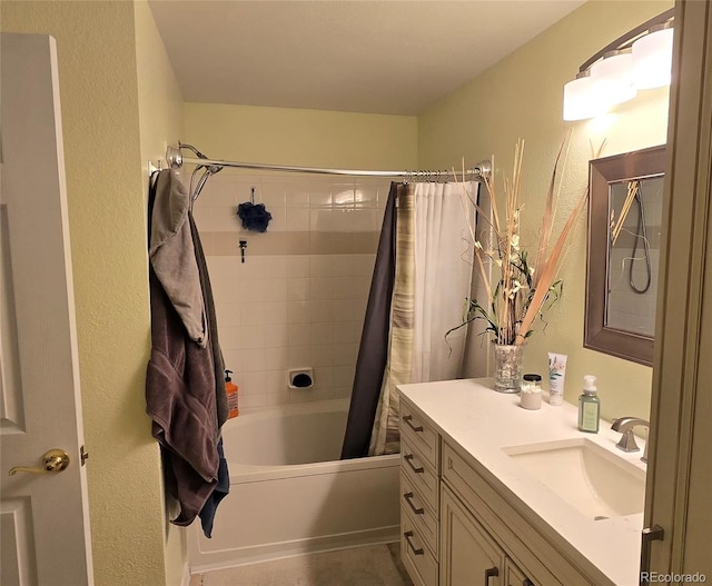 7440 S Blackhawk St Unit 2-106, Englewood, CO 80112 - bathroom with vanity, shower / bath combo, and a textured wall