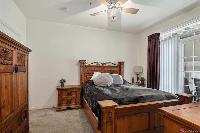 7440 S Blackhawk St Unit 2-106, Englewood, CO 80112 - bedroom with light carpet and a ceiling fan