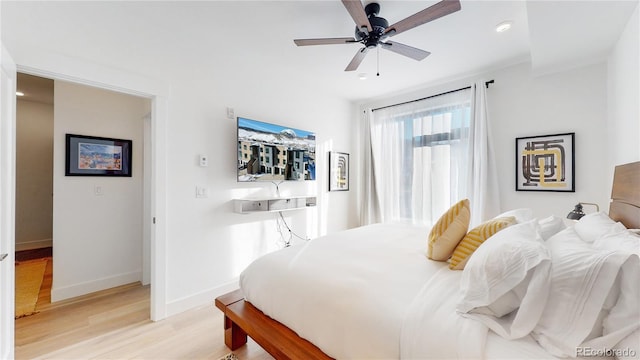 930 Blue River Pkwy Unit 622, Silverthorne, CO 80498 - bedroom featuring light wood-style floors, baseboards, recessed lighting, and a ceiling fan