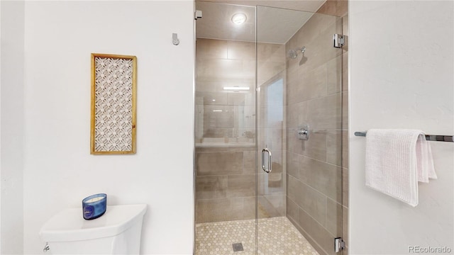 930 Blue River Pkwy Unit 622, Silverthorne, CO 80498 - full bathroom with a stall shower and toilet