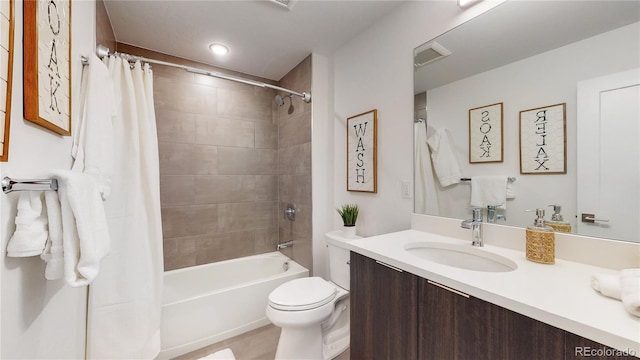 930 Blue River Pkwy Unit 622, Silverthorne, CO 80498 - bathroom featuring toilet, vanity, and shower / bath combo with shower curtain