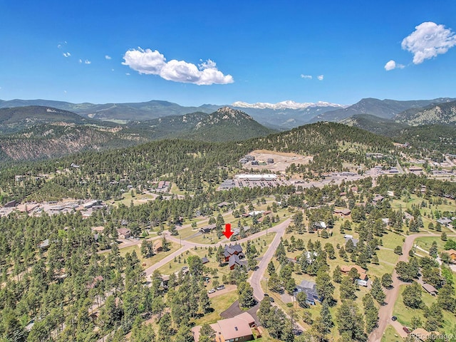 birds eye view of property featuring a mountain view