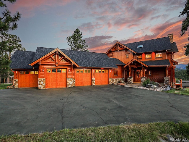 log cabin with a garage