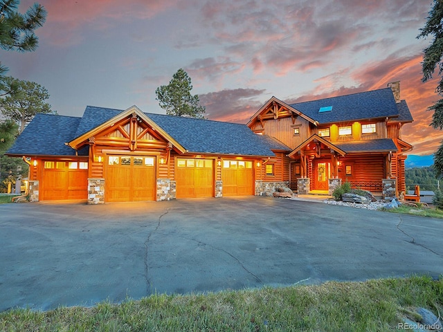 cabin featuring a garage