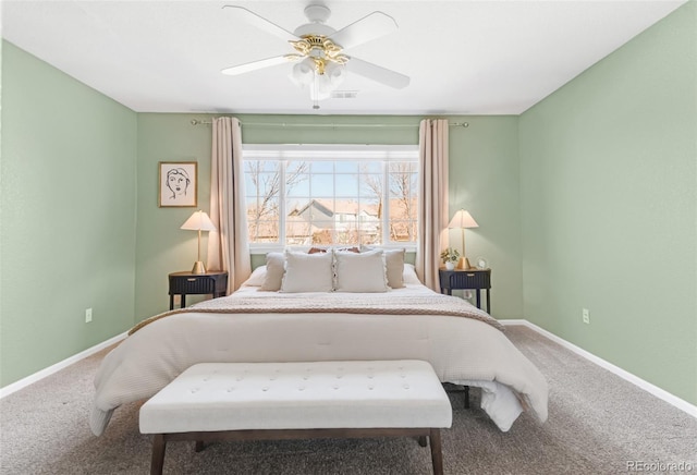 bedroom featuring ceiling fan, carpet floors, visible vents, and baseboards