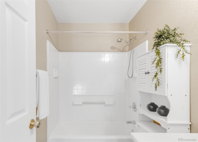 full bathroom with shower / bath combination and toilet