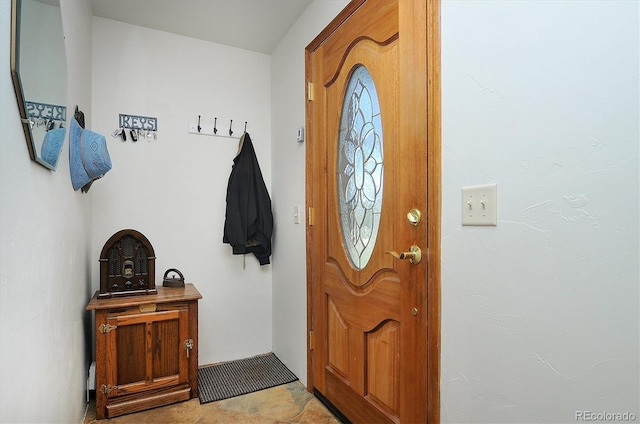 foyer entrance featuring tile flooring