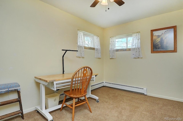 carpeted office with baseboard heating and ceiling fan