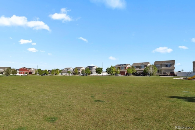 20826 Robins Dr, Denver, CO 80249 - surrounding community with a residential view and a lawn