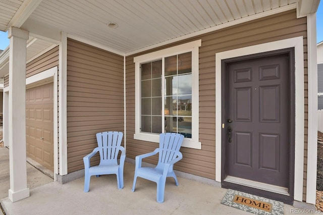 20826 Robins Dr, Denver, CO 80249 - view of exterior entry with a garage