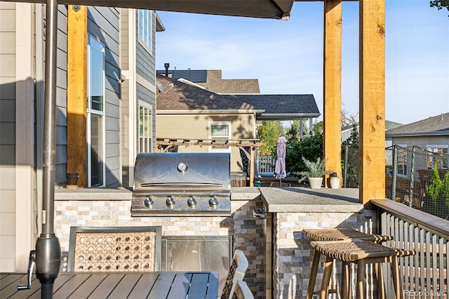 view of patio featuring an outdoor kitchen and area for grilling