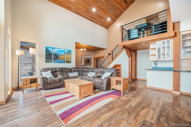 living room with recessed lighting, high vaulted ceiling, wooden ceiling, and hardwood / wood-style floors