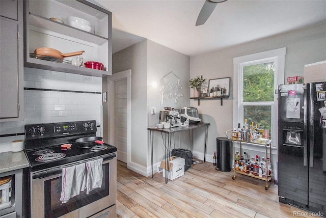 3764 N Raleigh St, Denver, CO 80212 - kitchen with stainless steel electric range oven, refrigerator with ice dispenser, tasteful backsplash, a ceiling fan, and light wood-type flooring