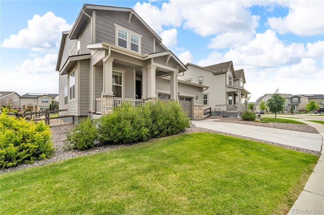 4884 St Vrain Rd, Firestone, CO 80504 - craftsman-style house featuring a porch, concrete driveway, a front yard, a residential view, and an attached garage