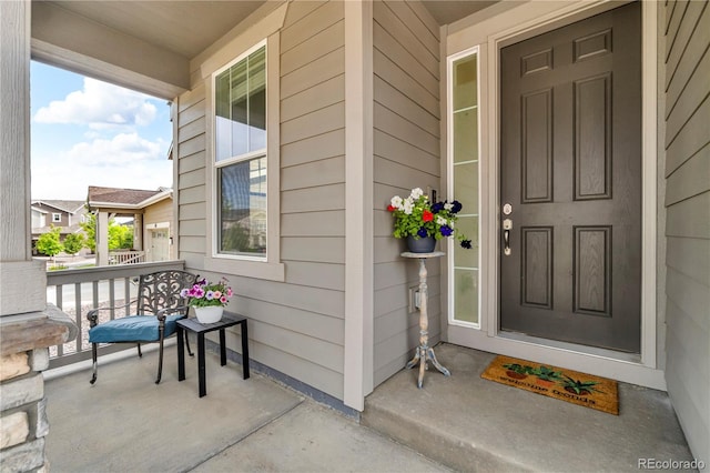 4884 St Vrain Rd, Firestone, CO 80504 - view of exterior entry with covered porch