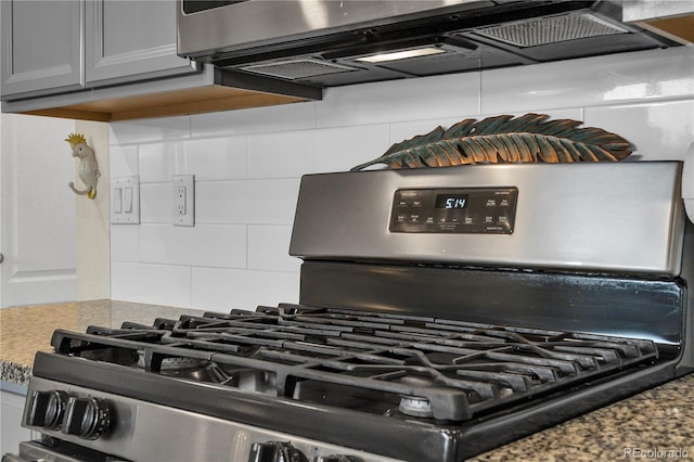 4884 St Vrain Rd, Firestone, CO 80504 - kitchen view of gas stove and tasteful backsplash