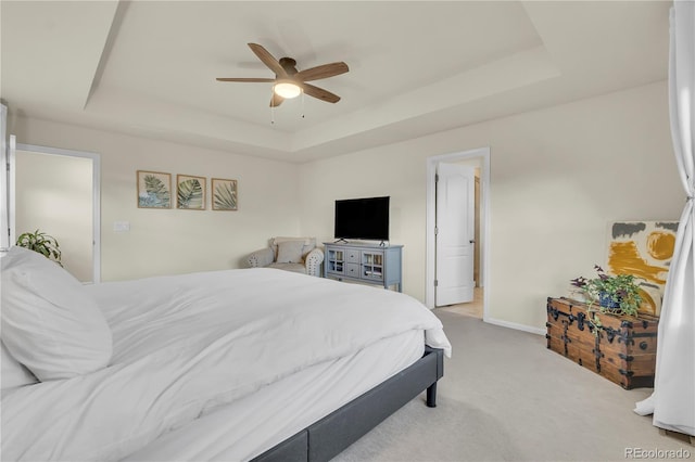 4884 St Vrain Rd, Firestone, CO 80504 - bedroom featuring a raised ceiling, carpet, baseboards, and ceiling fan