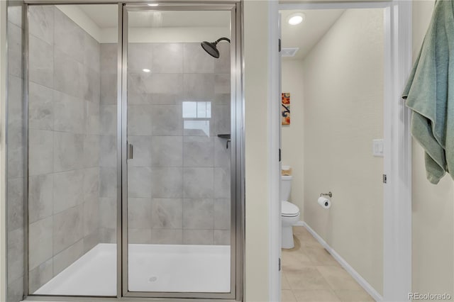 4884 St Vrain Rd, Firestone, CO 80504 - full bathroom featuring toilet, a stall shower, tile patterned flooring, and baseboards