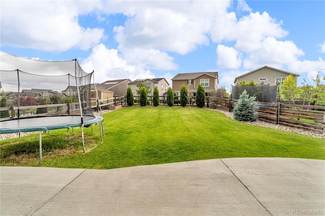 4884 St Vrain Rd, Firestone, CO 80504 - view of yard featuring a trampoline and a residential view