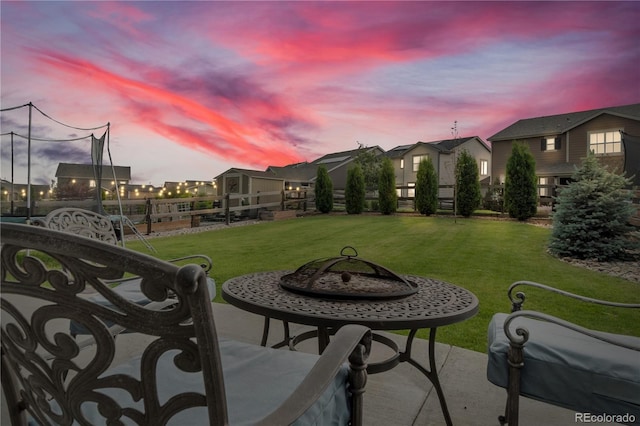 4884 St Vrain Rd, Firestone, CO 80504 - patio terrace at dusk featuring a residential view