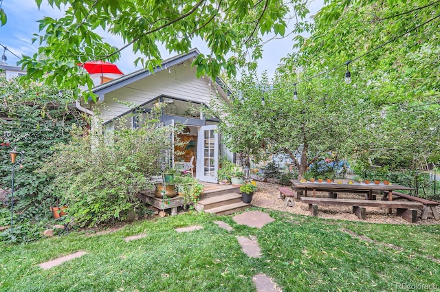 1580 Redwood Ave, Boulder, CO 80304 - view of front of house featuring a front yard