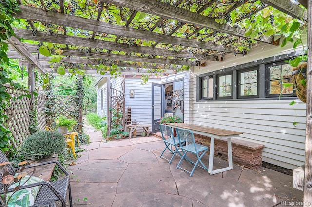 1580 Redwood Ave, Boulder, CO 80304 - view of patio / terrace with outdoor dining area and a pergola