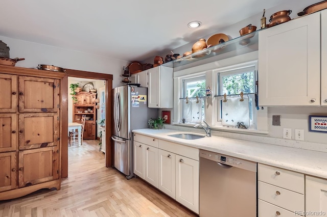 1580 Redwood Ave, Boulder, CO 80304 - kitchen featuring stainless steel appliances, light countertops, white cabinets, and recessed lighting