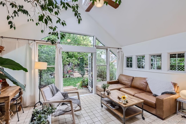 1580 Redwood Ave, Boulder, CO 80304 - living area featuring high vaulted ceiling, healthy amount of natural light, ceiling fan, and light tile patterned flooring