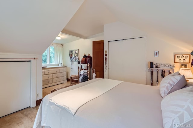 1580 Redwood Ave, Boulder, CO 80304 - bedroom featuring vaulted ceiling and light wood-style floors