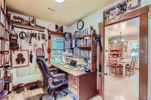 1580 Redwood Ave, Boulder, CO 80304 - home office featuring a chandelier and light wood-type flooring
