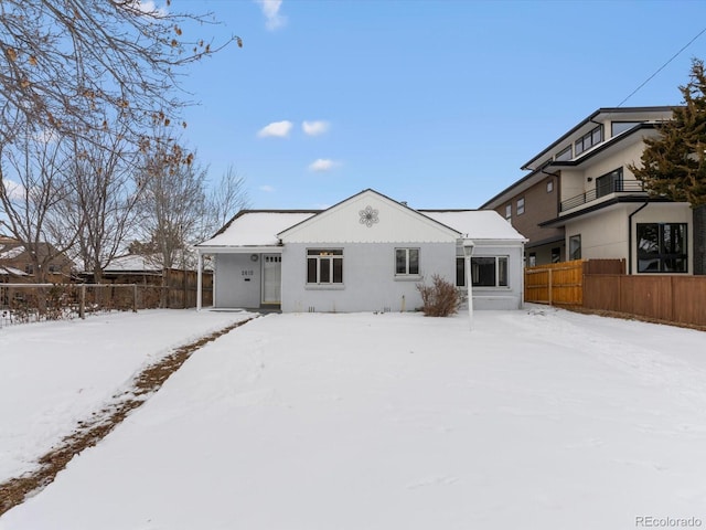 view of snow covered property