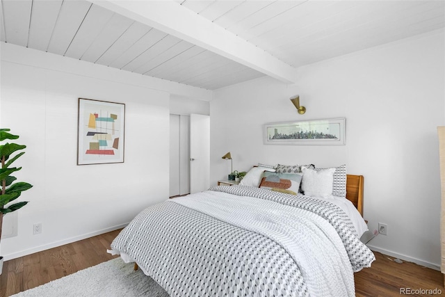 1338 S Fairfax St, Denver, CO 80222 - bedroom with beamed ceiling and wood finished floors
